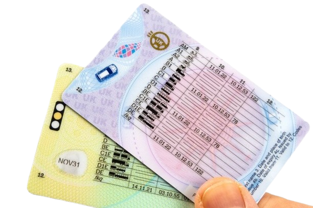 A hand holding insurance and identification cards